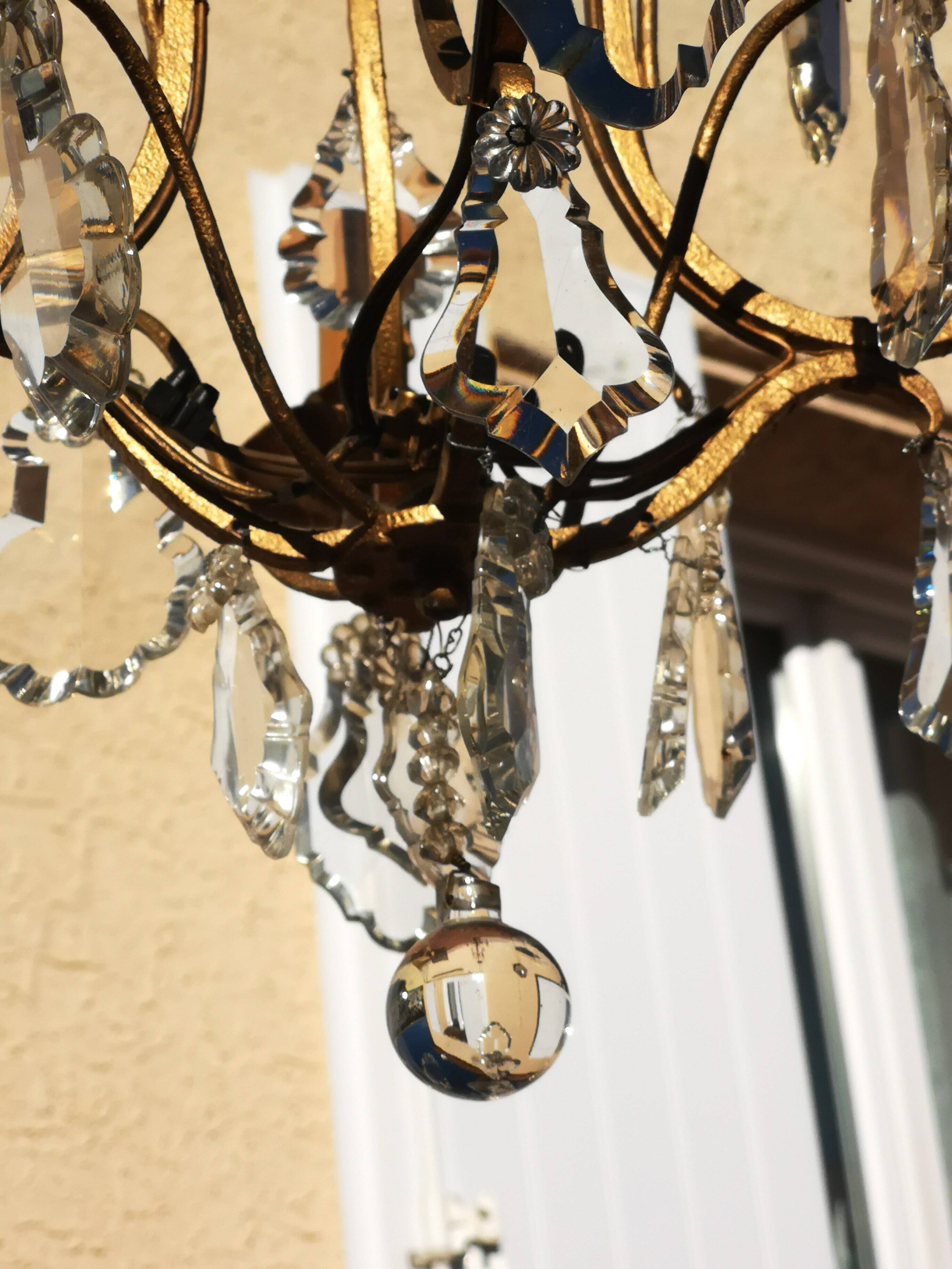 Wrought iron chandelier with pendants