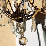 Lustre en fer forgé avec pâmpîlles