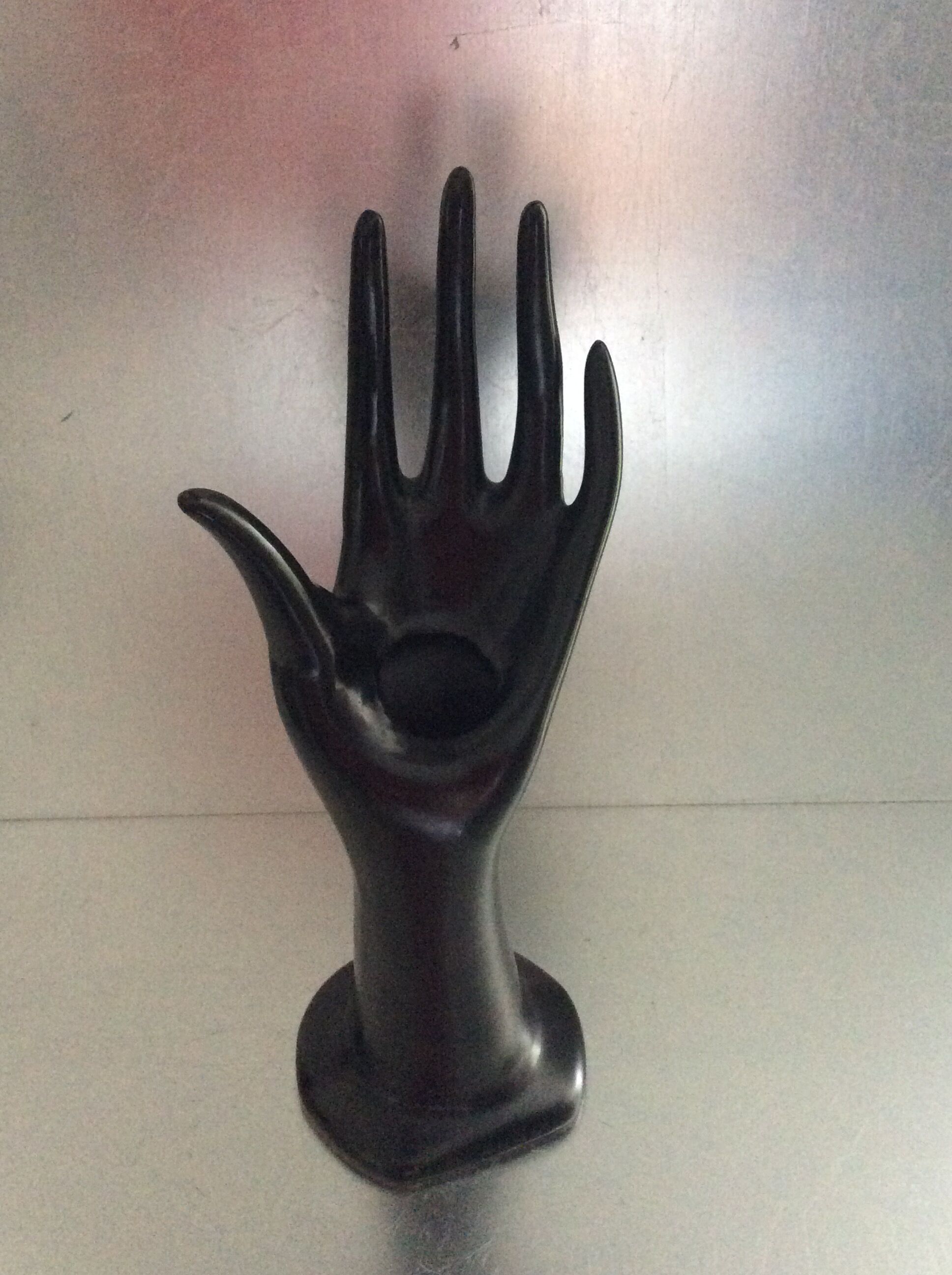 Vintage black ceramic hand