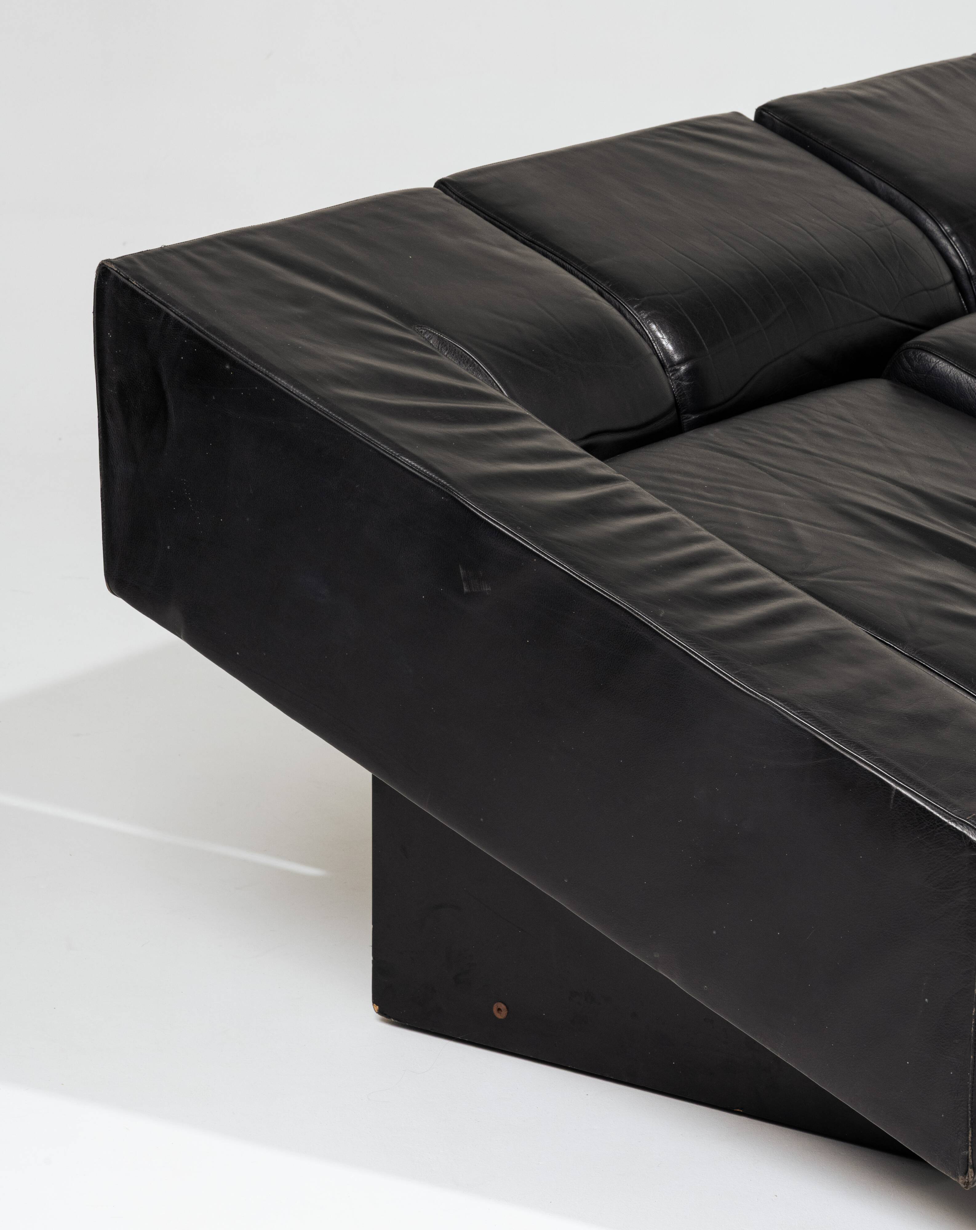 Obliqua two-seater leather sofa, Mario Botta, 1980s