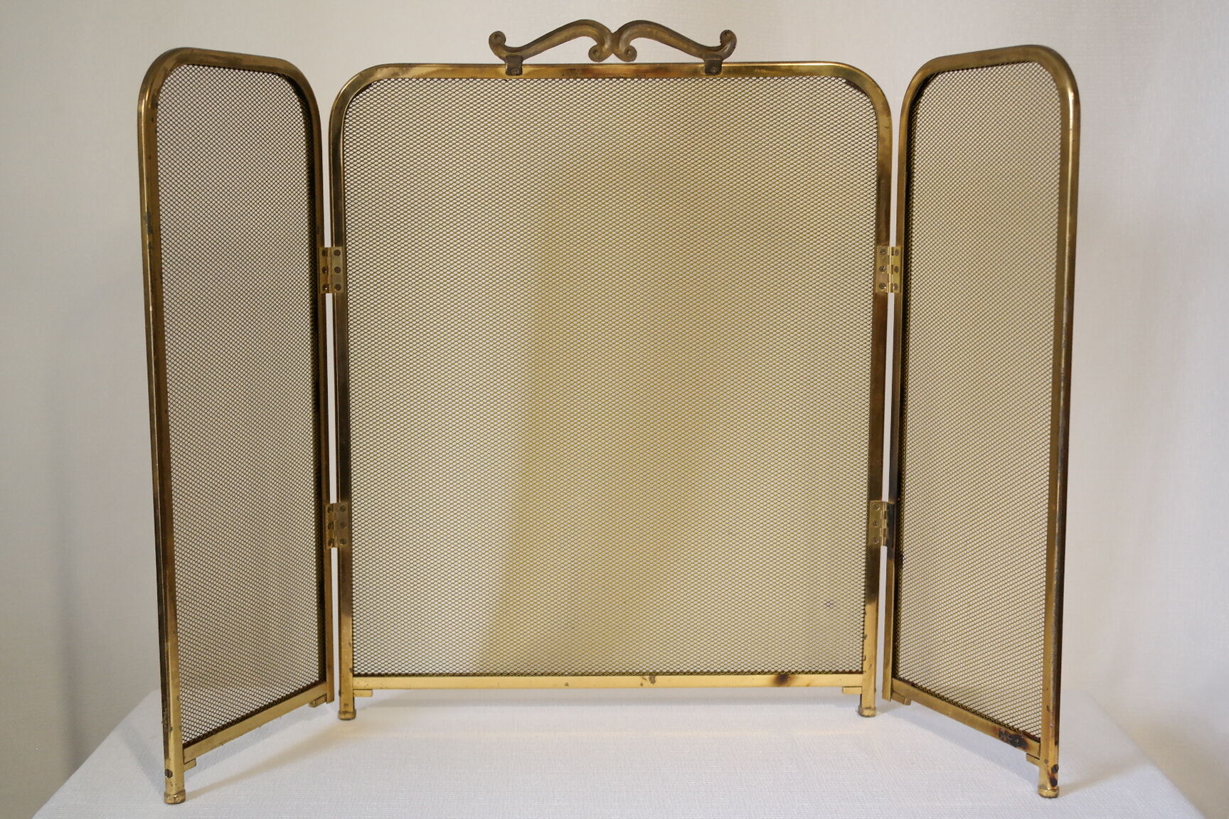 Vintage brass chimney firewall
