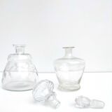 Set of 2 chiseled glass decanters with cap