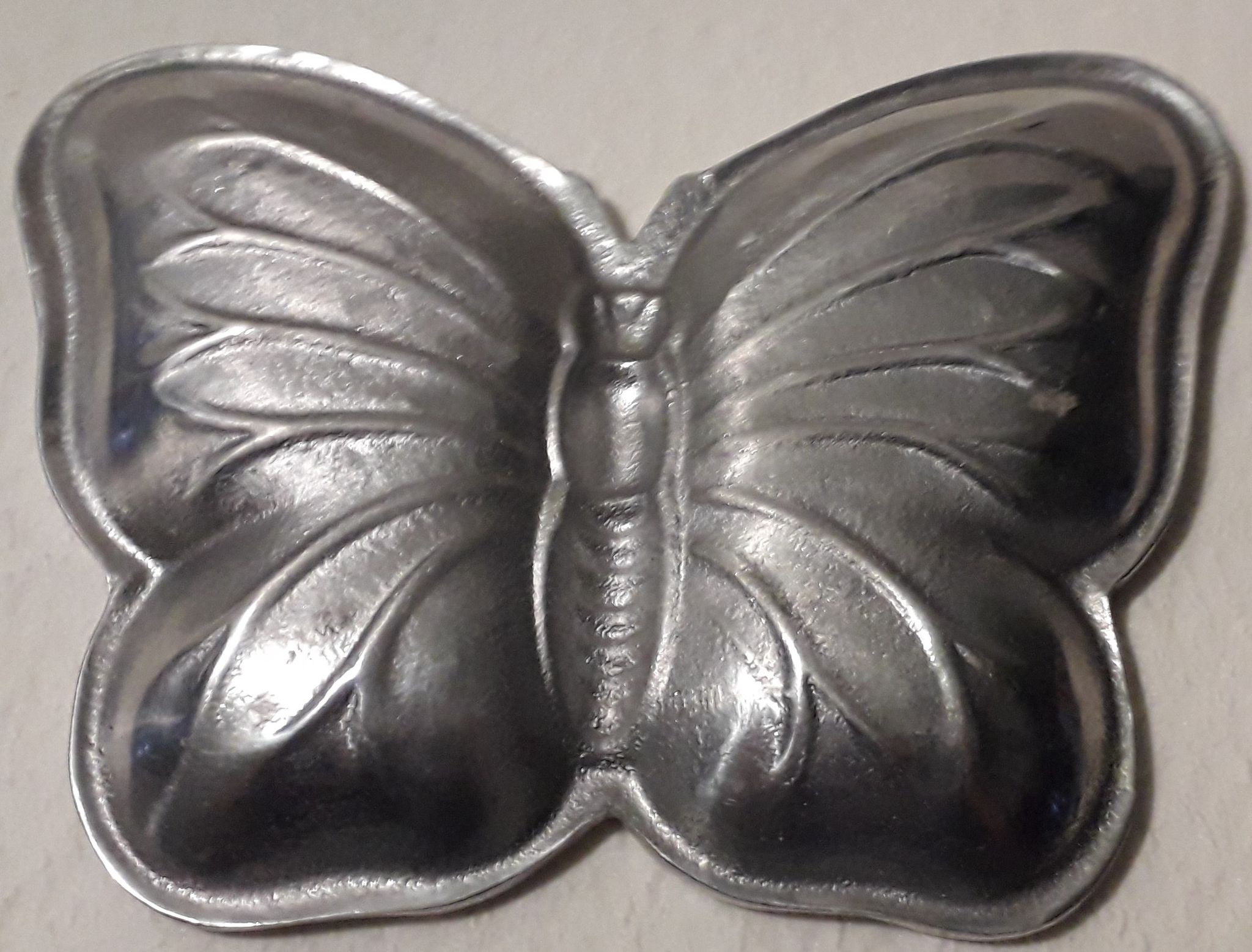 Vide poche papillon en fonte d'aluminium