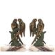 Art Deco pair of bookends with metal parrots and a marble base.
