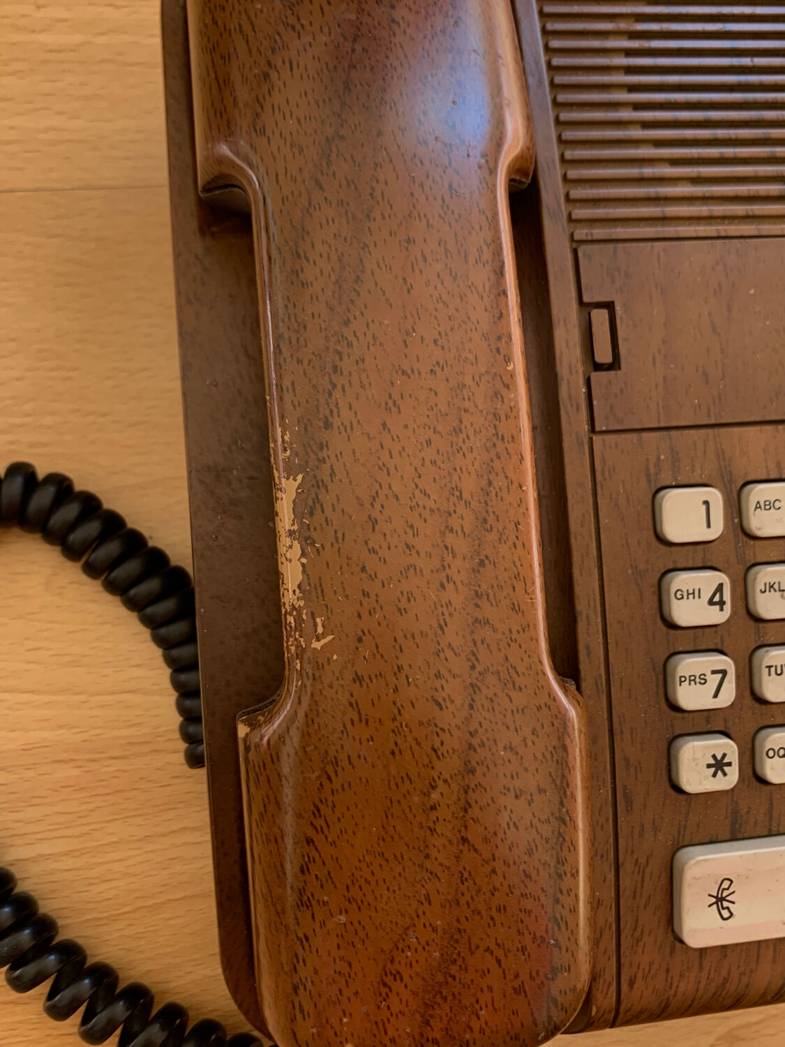 Old Thomson bakelite telephone and vintage wood