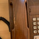 Old Thomson bakelite telephone and vintage wood