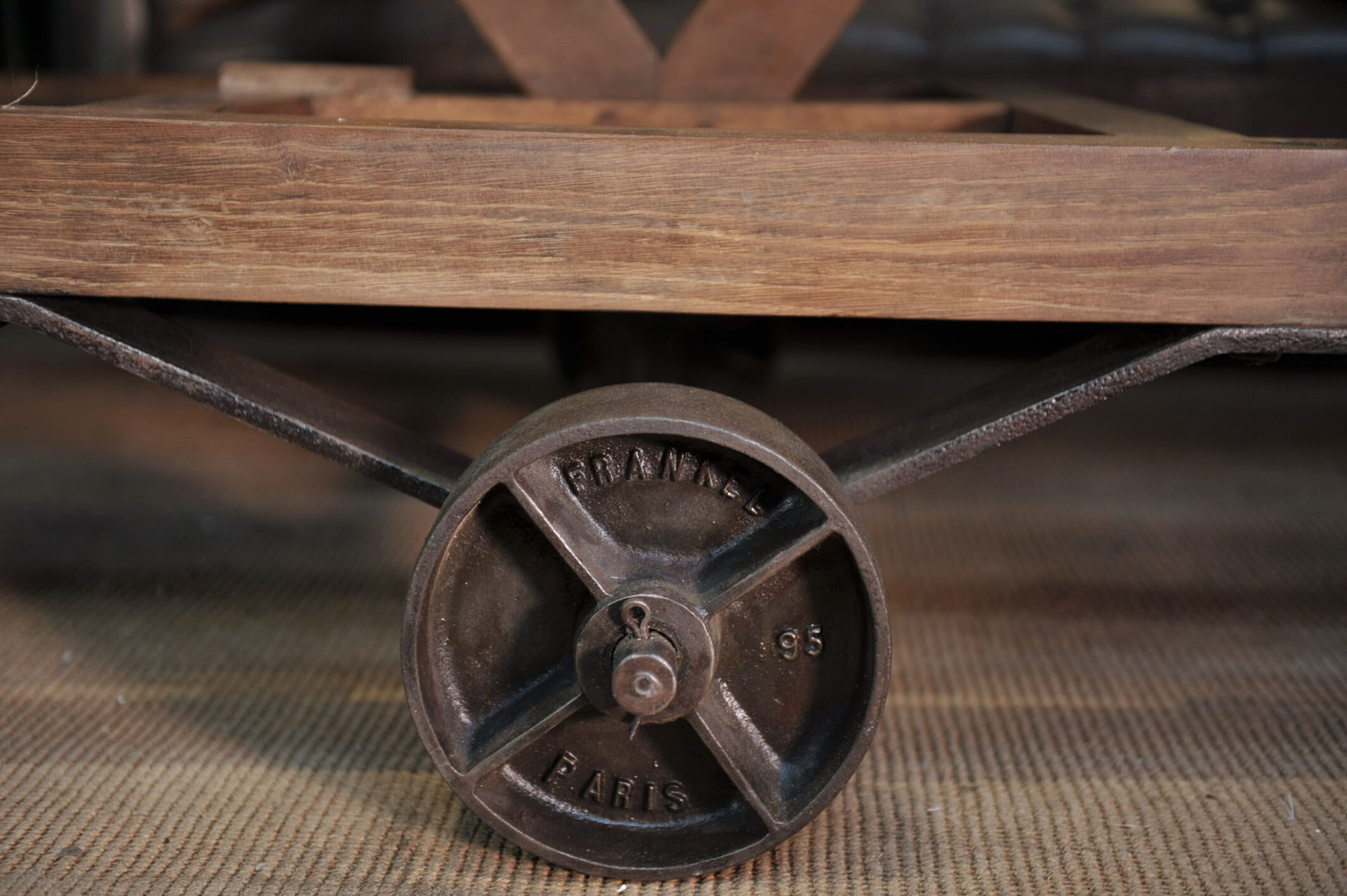 Former wooden factory shelf on metal wheels 1900