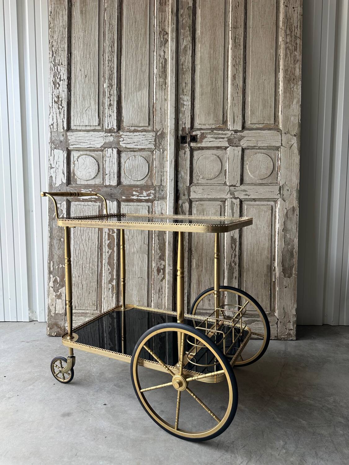 Vintage black and gold rolling trolley