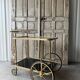 Vintage black and gold rolling trolley