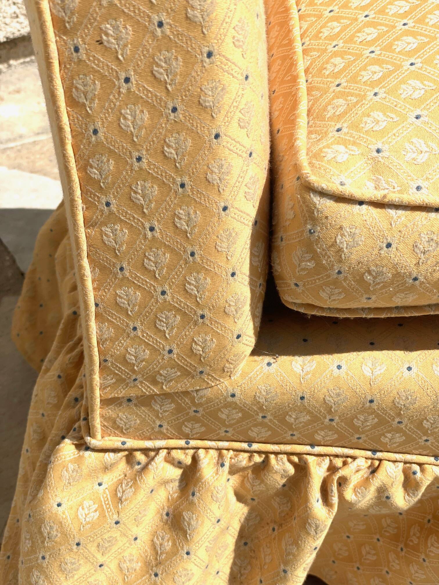 Vintage upholstered fabric toad armchair