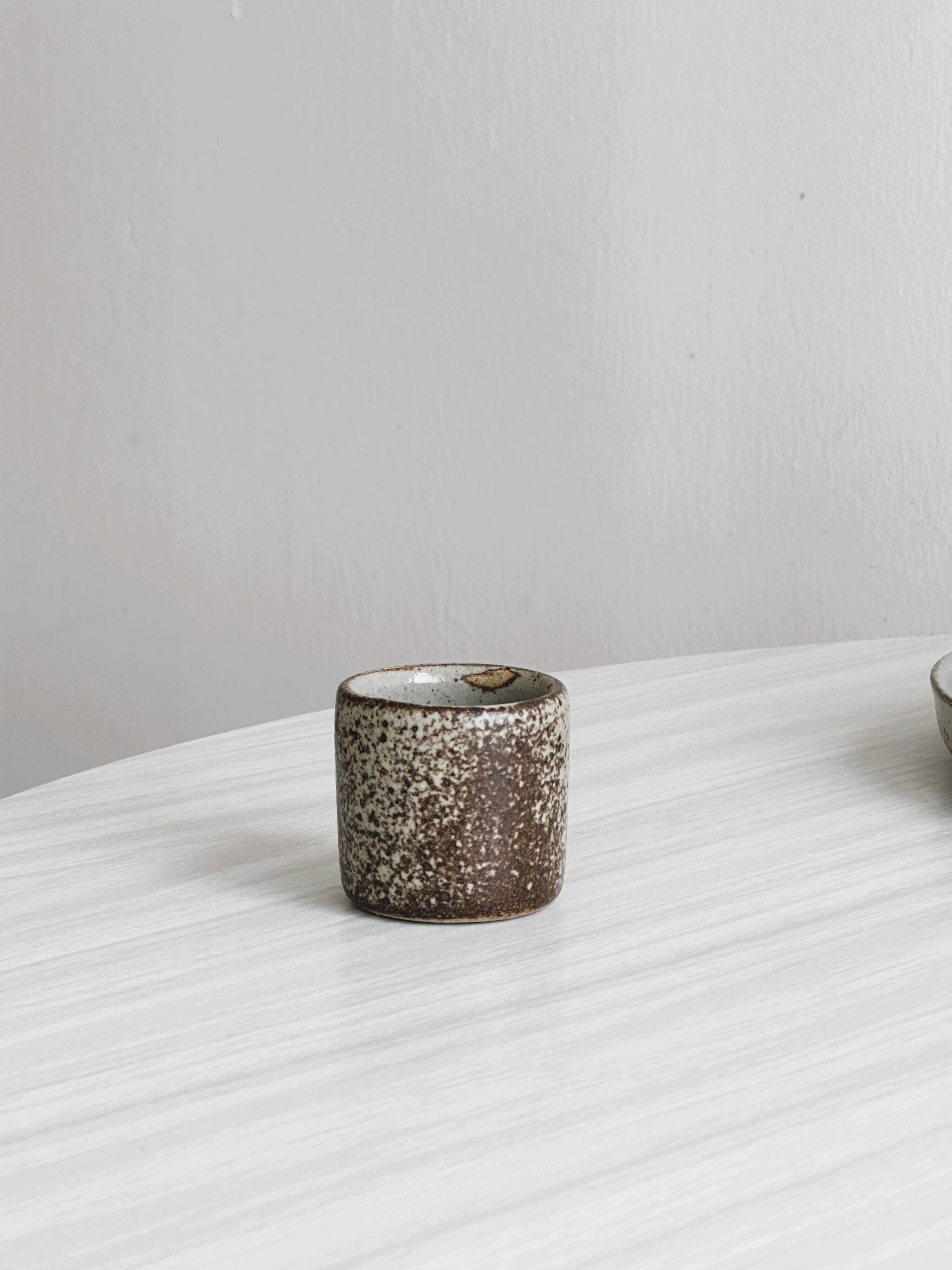 Handcrafted stoneware set of 6 liqueur glasses and matching plate