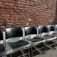 Set of 6 black metal chairs, model GF 40/4 by David Rowland.