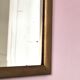 Petit miroir ancien en bois doré et glace biseautée
