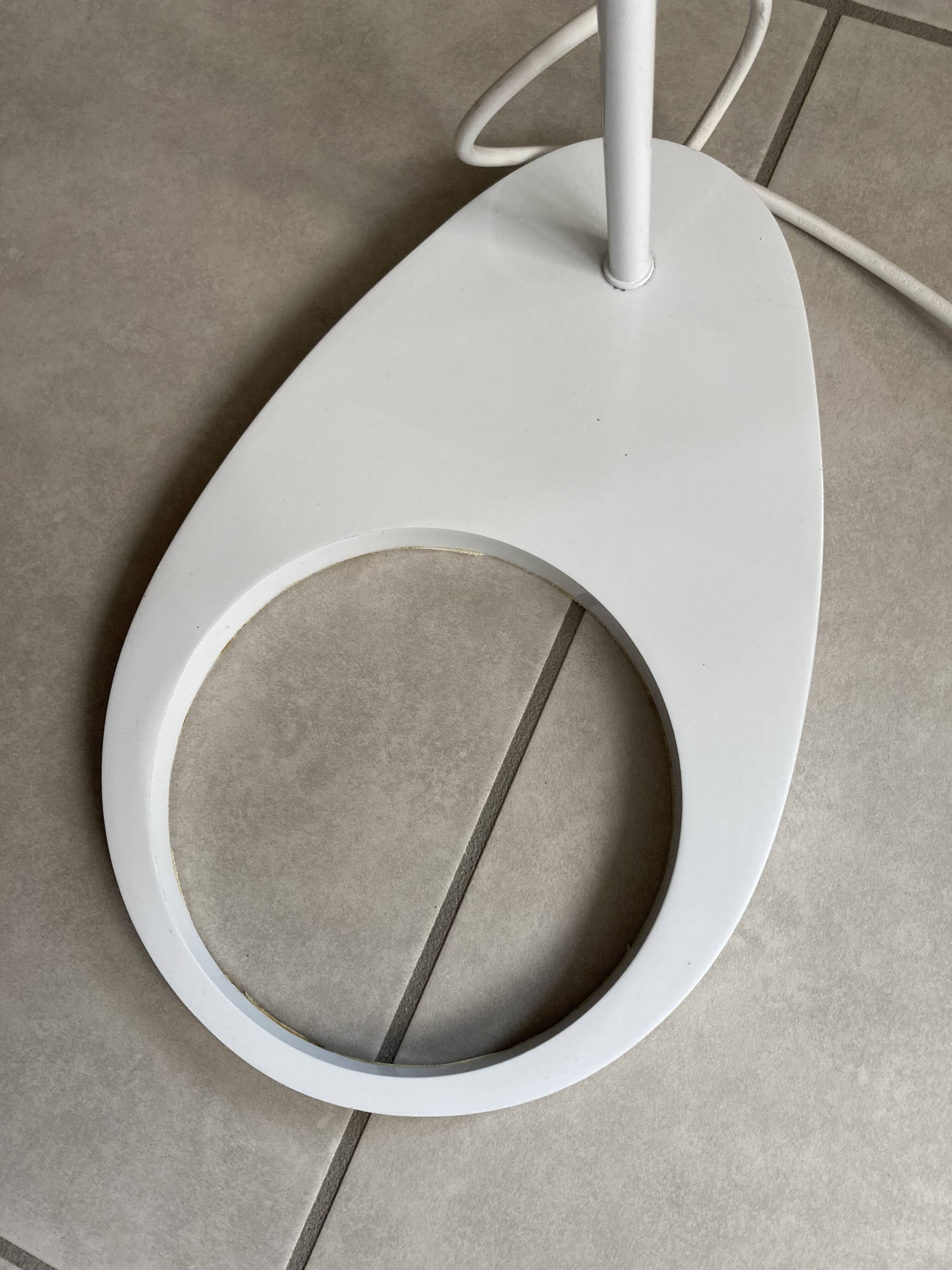 white lacquered metal reading lamp