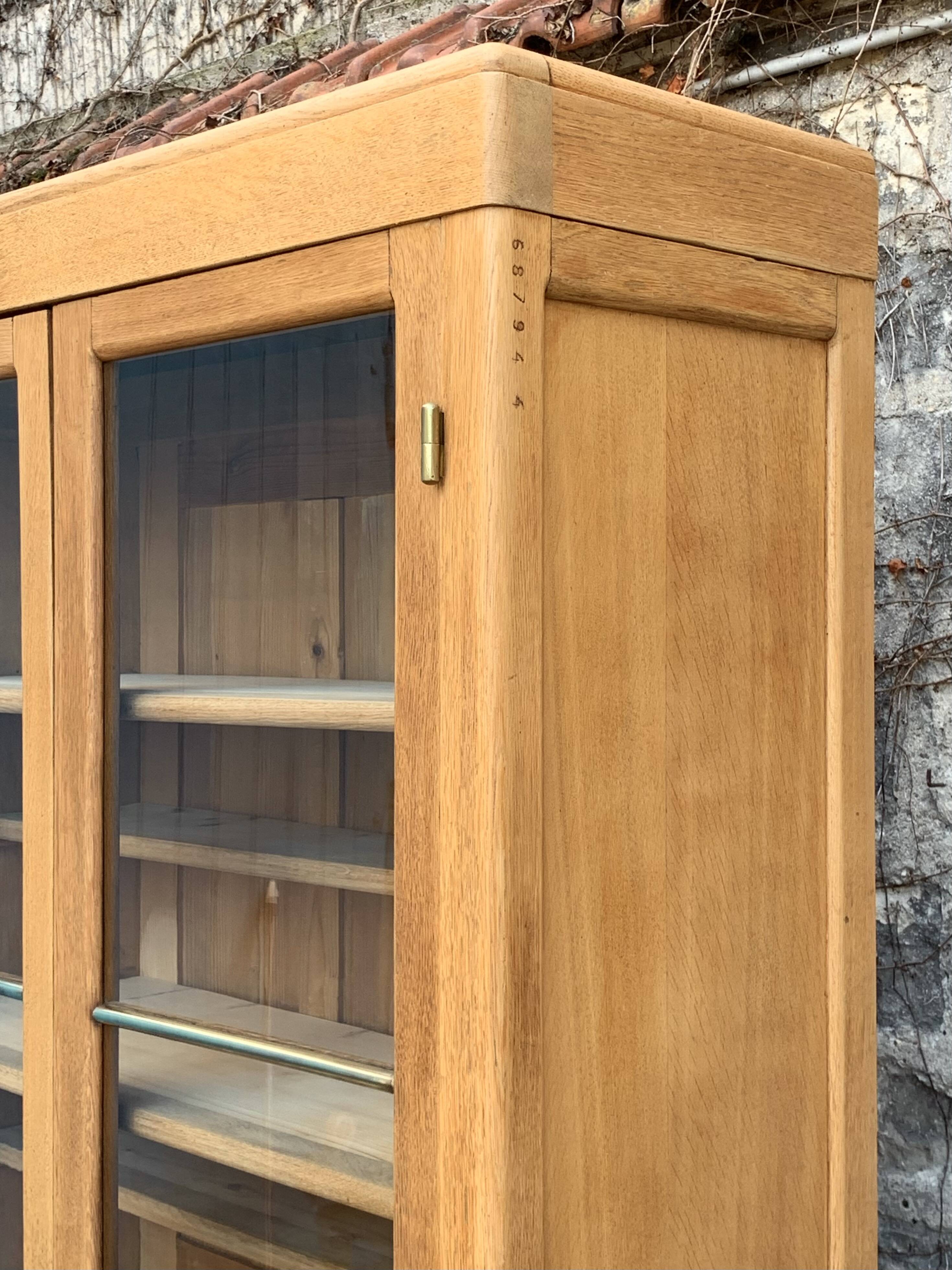 Parisian glass cabinet in solid raw oak, 1950