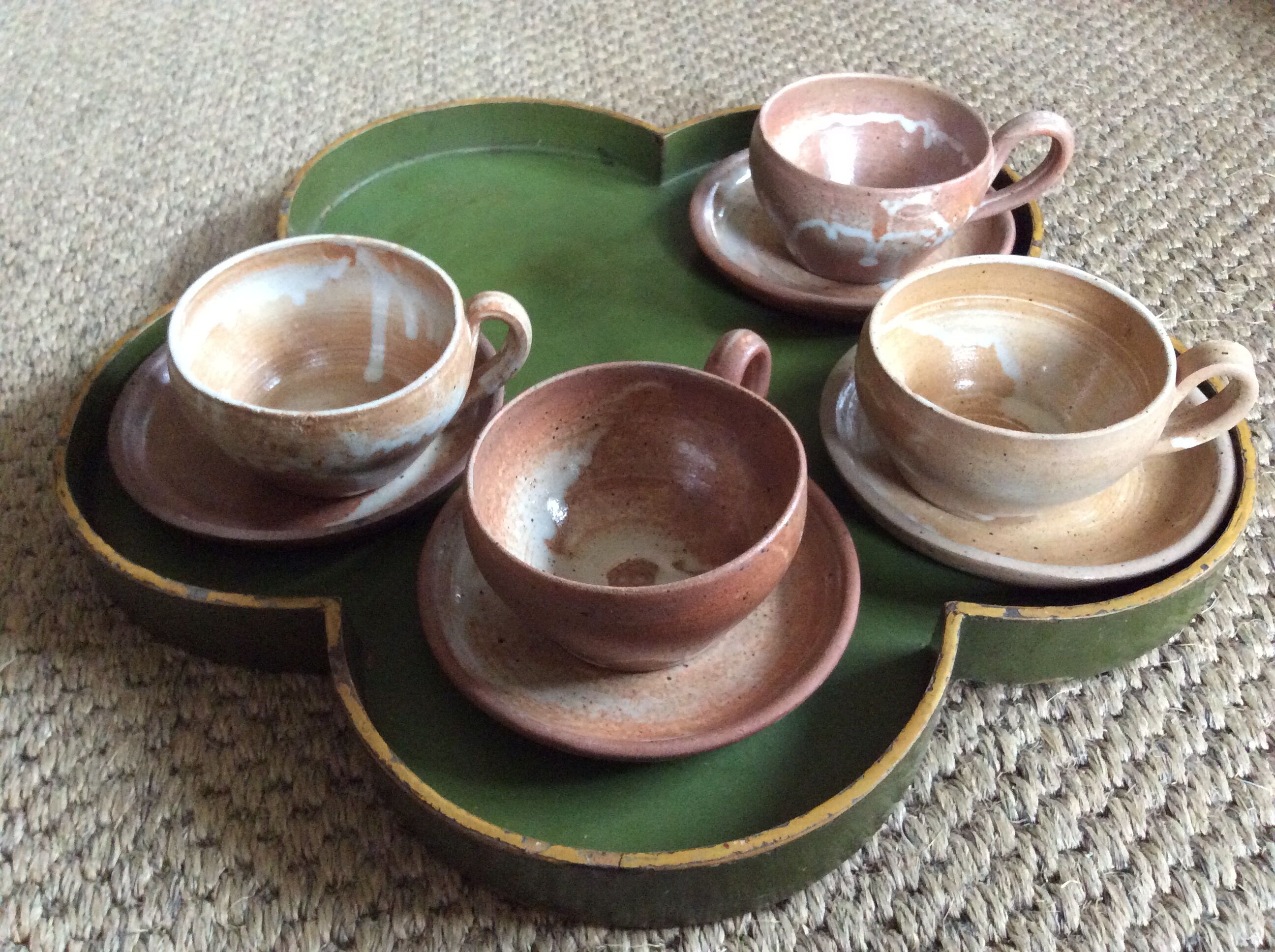 Series of 4 stoneware coffee cups
