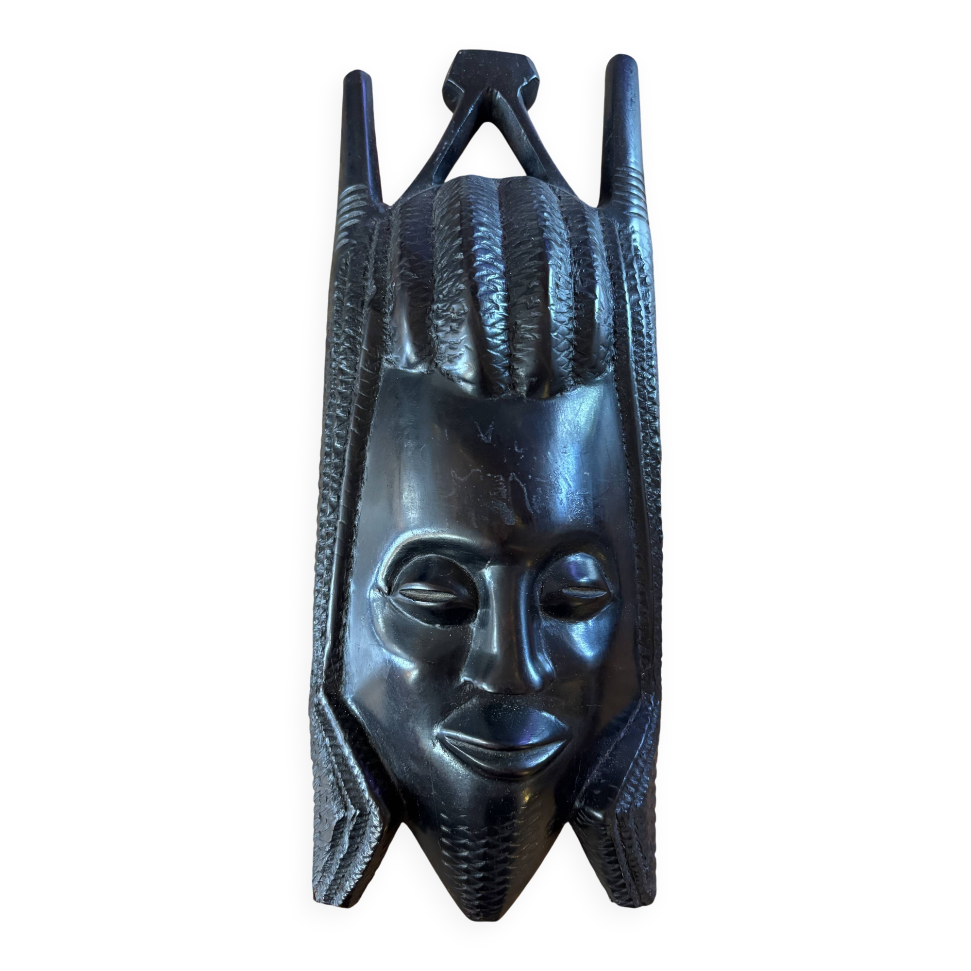 Masque Africain visage souriant en bois d'ébène.