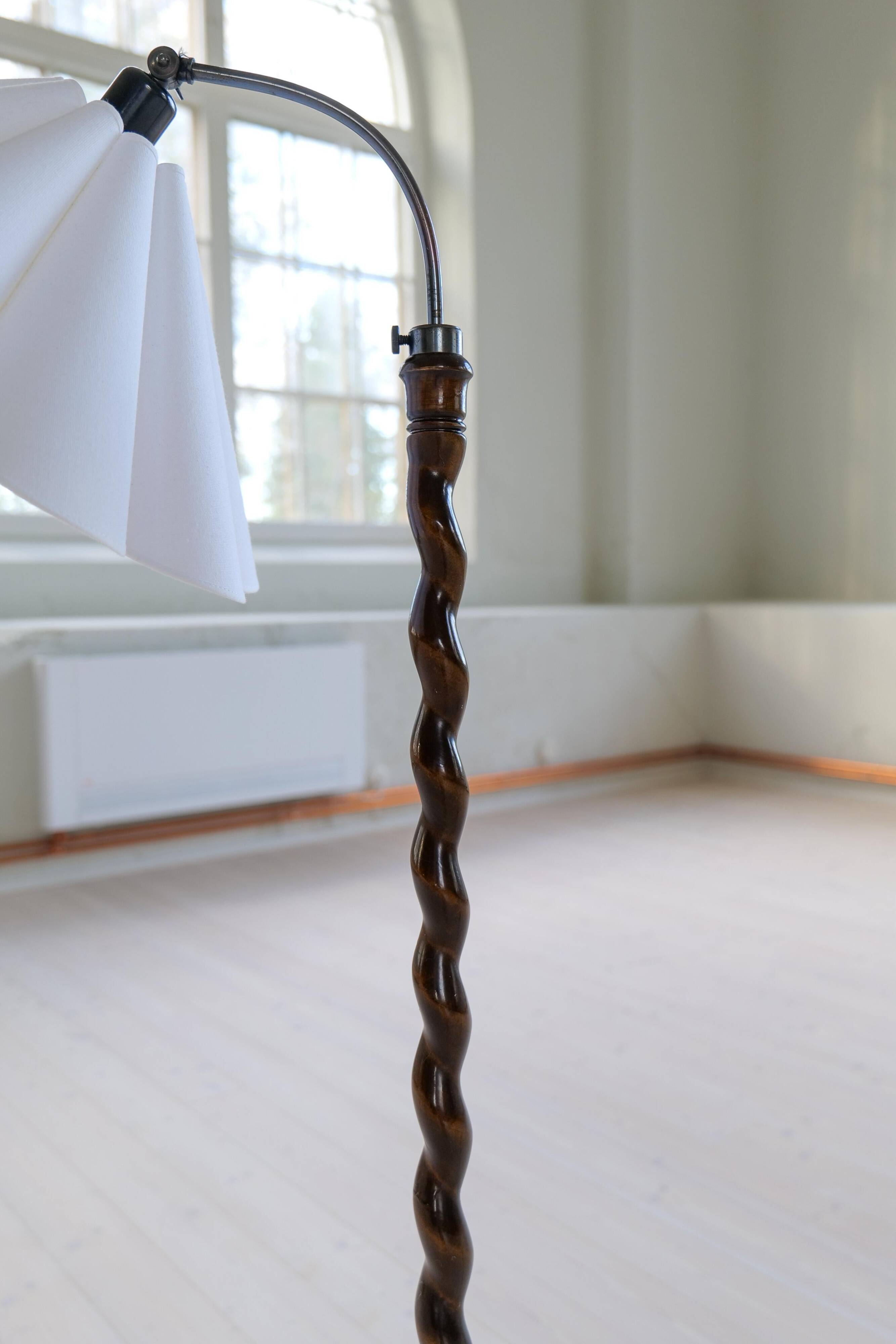 Organic whirlwind floor lamp in stained birch, Sweden, 1940s.