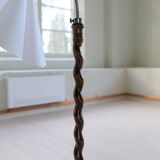 Organic whirlwind floor lamp in stained birch, Sweden, 1940s.