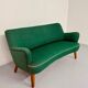 Old vintage green cocktail bean sofa from the 50s