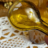 Blown glass oil dispenser with bubbles