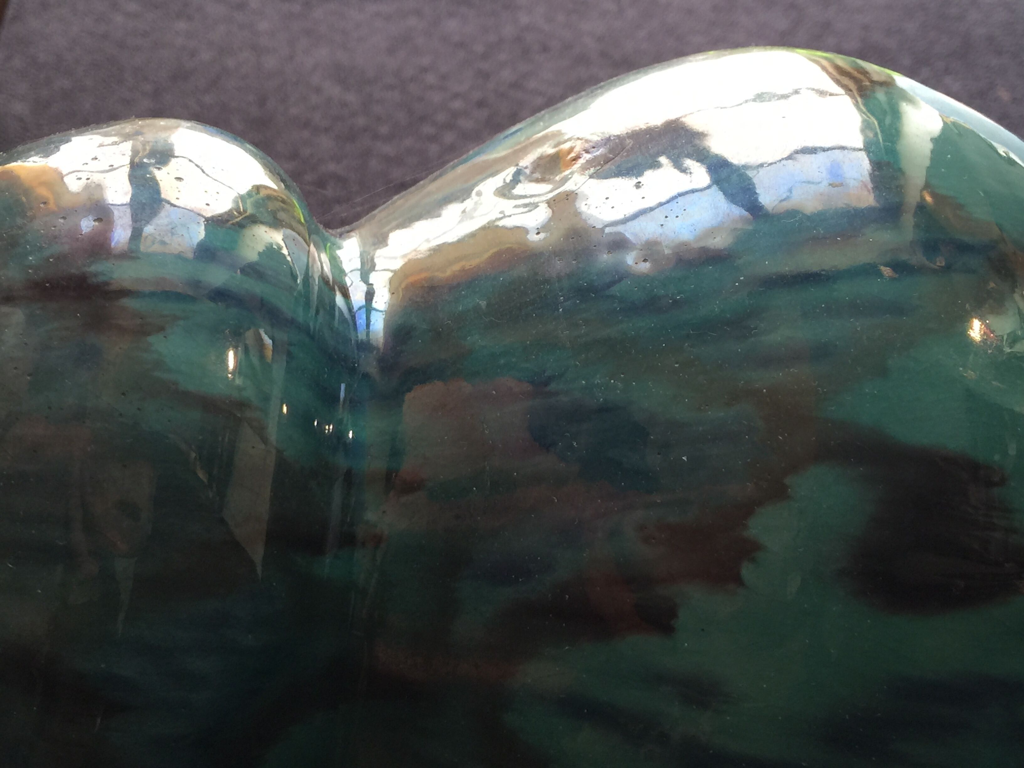 Enamelled ceramic vase, with a flaming blue-green décor