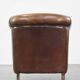 Characterful sheepskin leather club armchair with a luxurious, rustic appearance