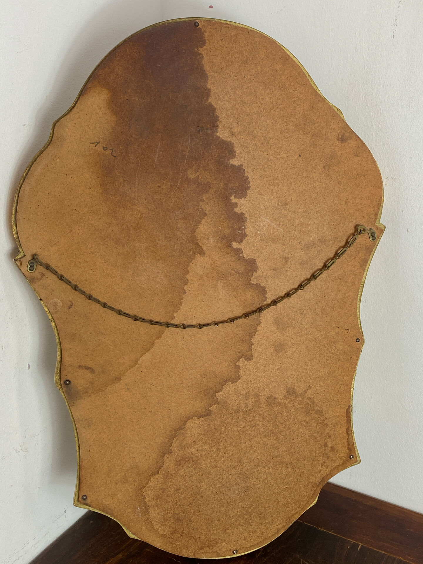 Large baroque mirror in gilded wood