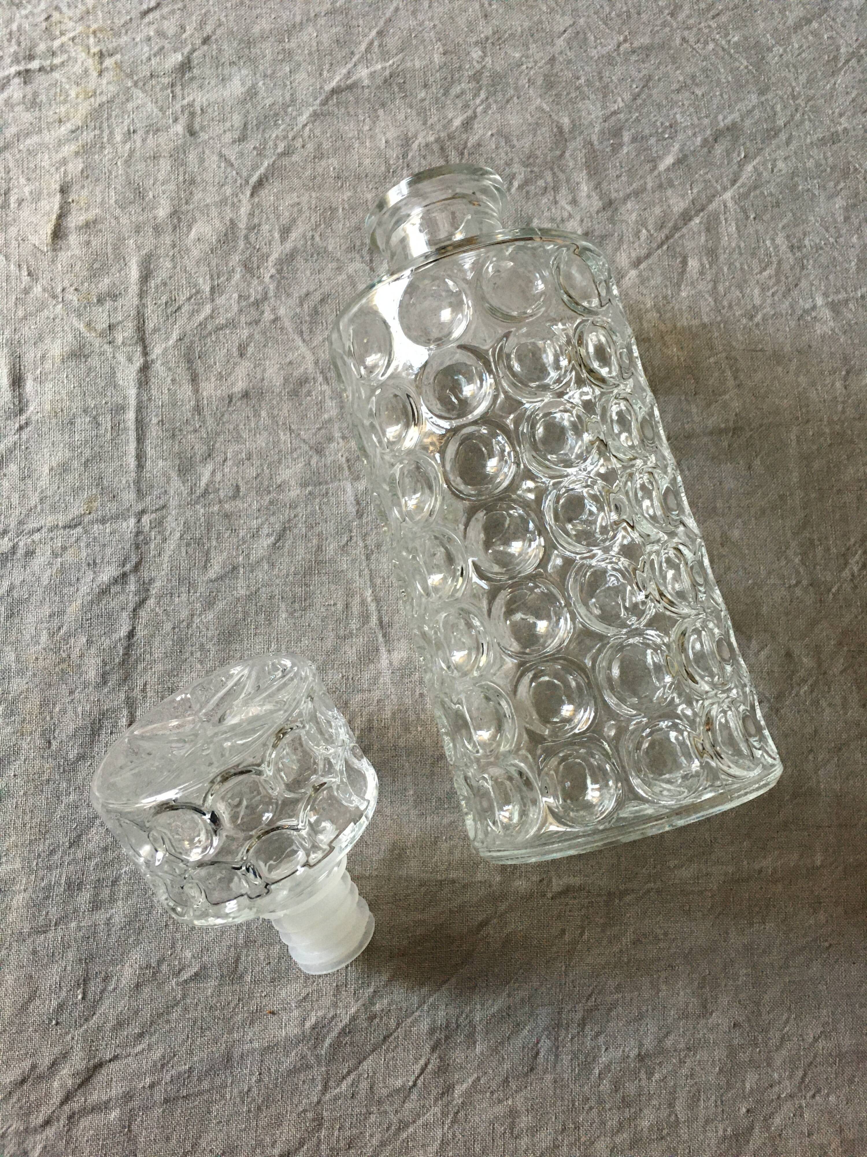 Vintage whisky carafe in transparent glass