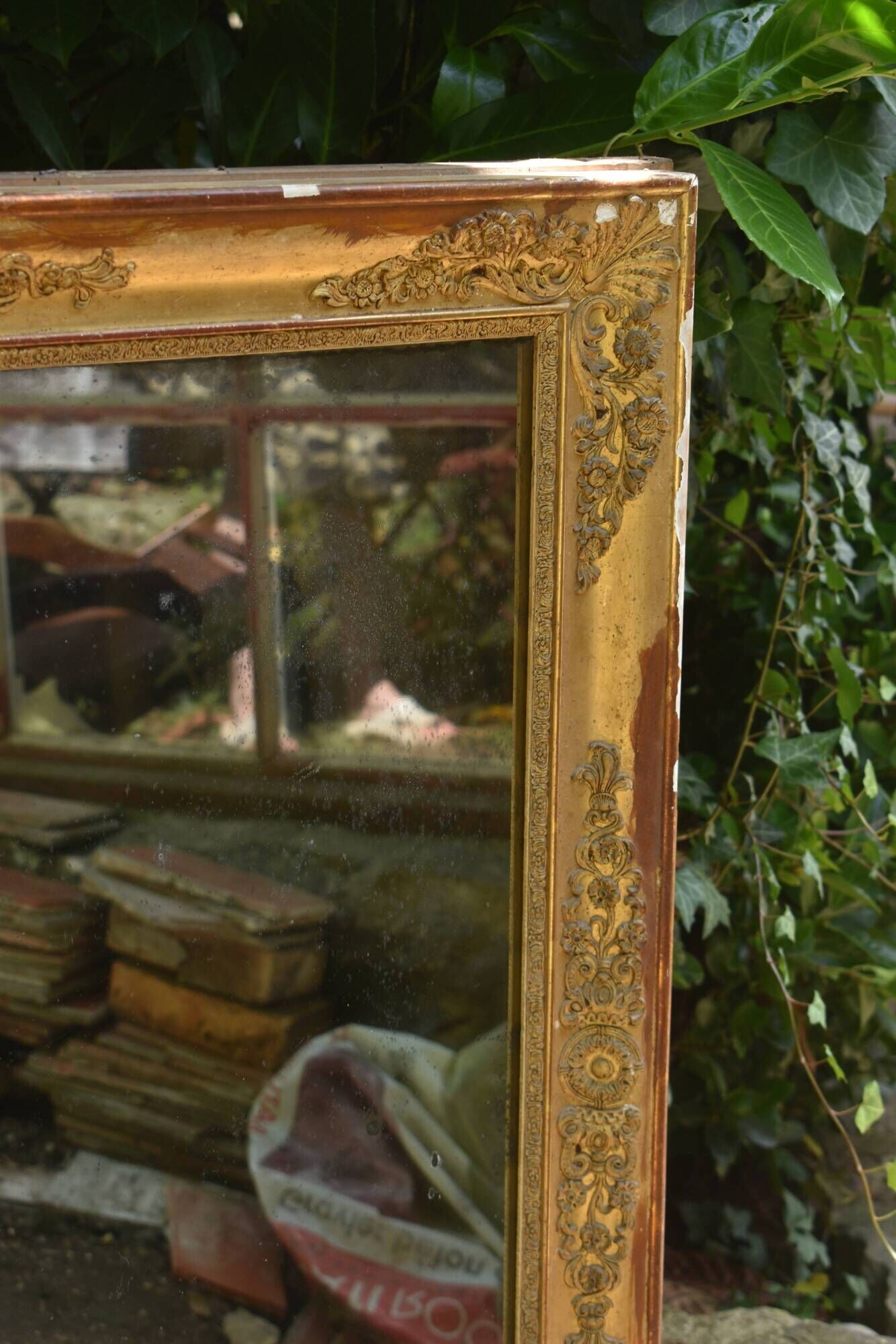 Large gilded Empire mirror from the 19th century.