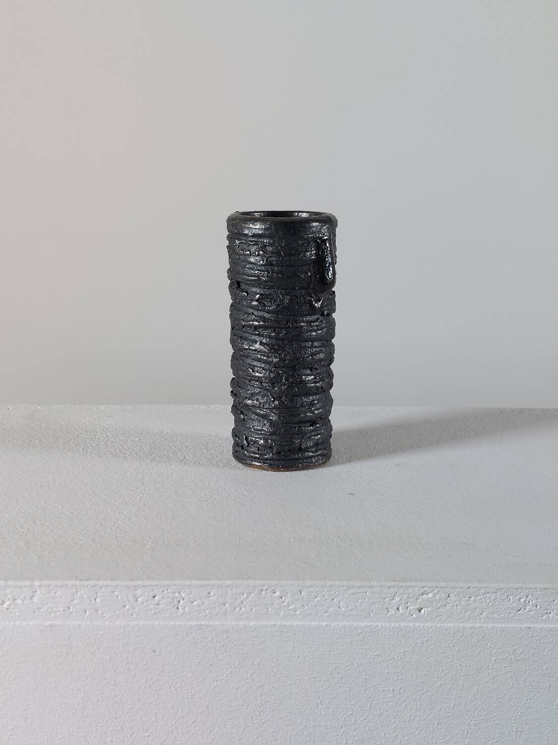 Small vintage brutalist vase with oxidised glaze from the 1950s.