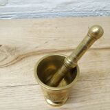 Golden brass mortar and pestle