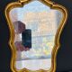 Small golden mirror