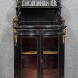 Curved "Boulle" display case from the Napoleon III period in blackened and gilded wood