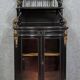 Curved "Boulle" display case from the Napoleon III period in blackened and gilded wood
