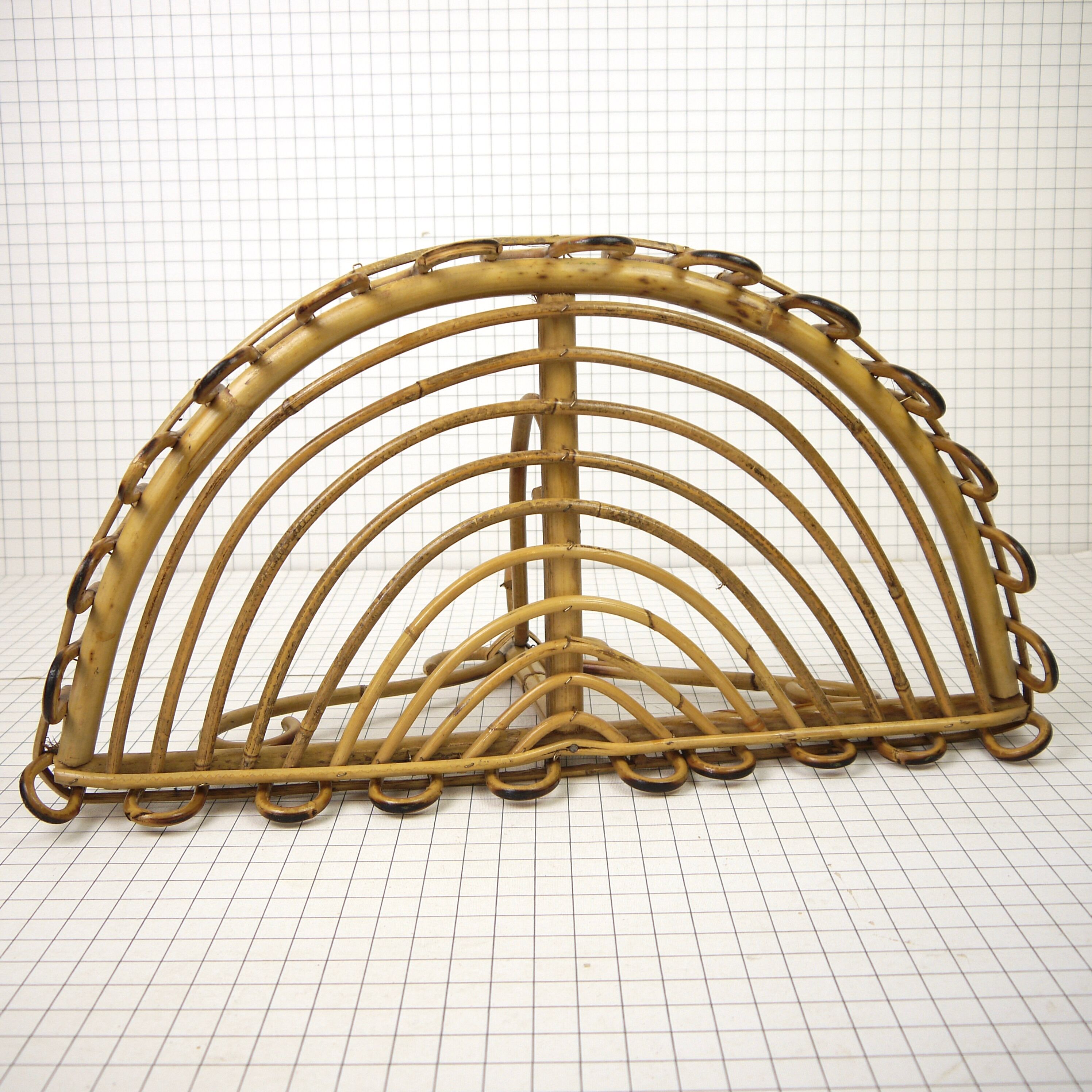 Half-moon rattan shelf and coat holder