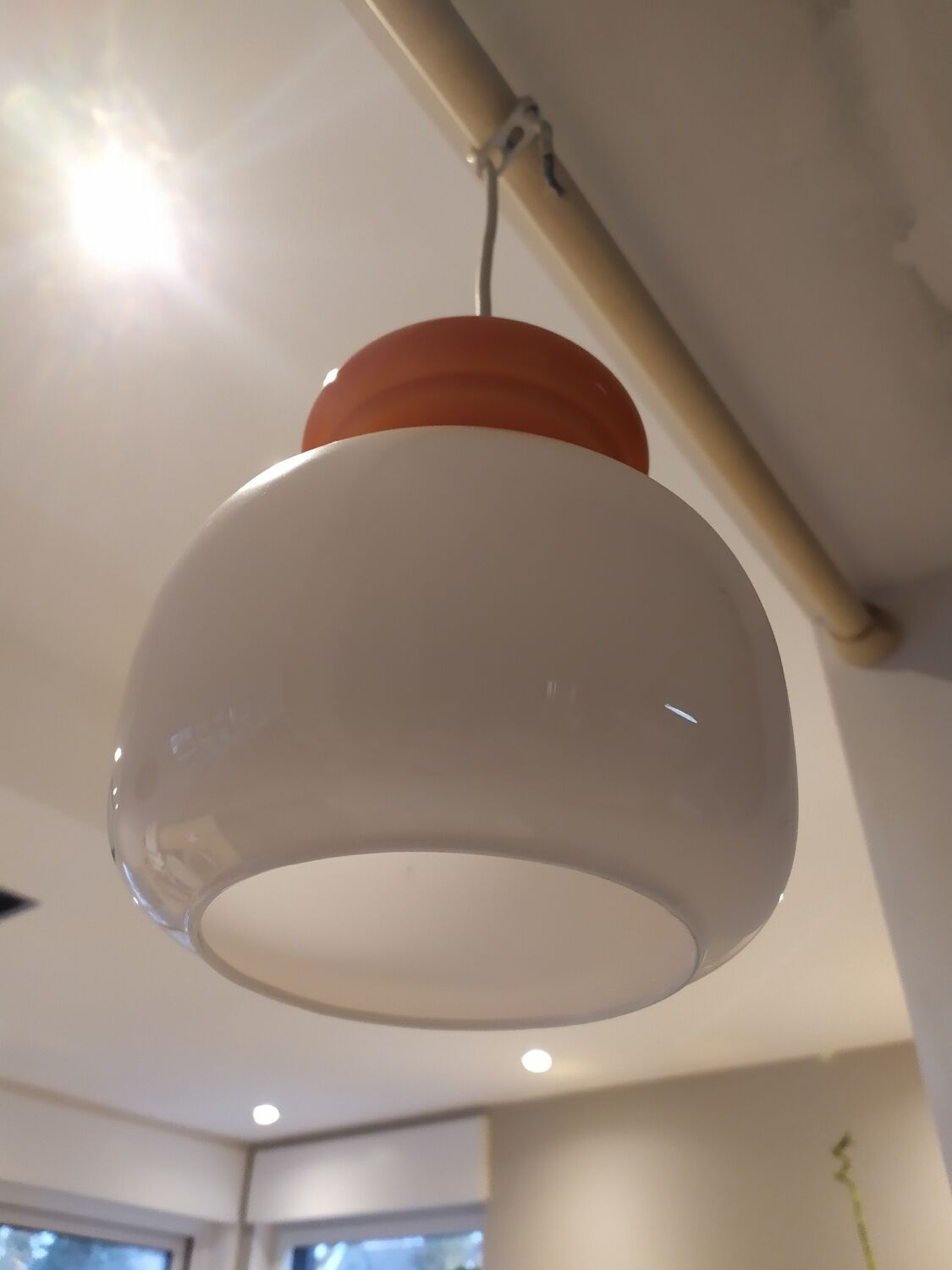 Pendant light in orange and white opaline