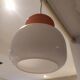 Pendant light in orange and white opaline