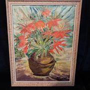 An old oil painting depicting a bouquet of flowers.
