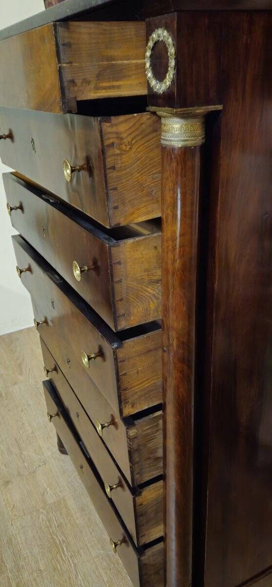 Empire period chest of drawers, early 19th century, in flame mahogany.