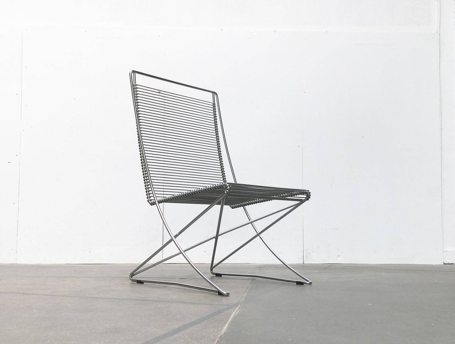 Vintage German Kreuzschwinger lounge chair by Till Behrens for Meyer Stahlmöbel, 1980s.