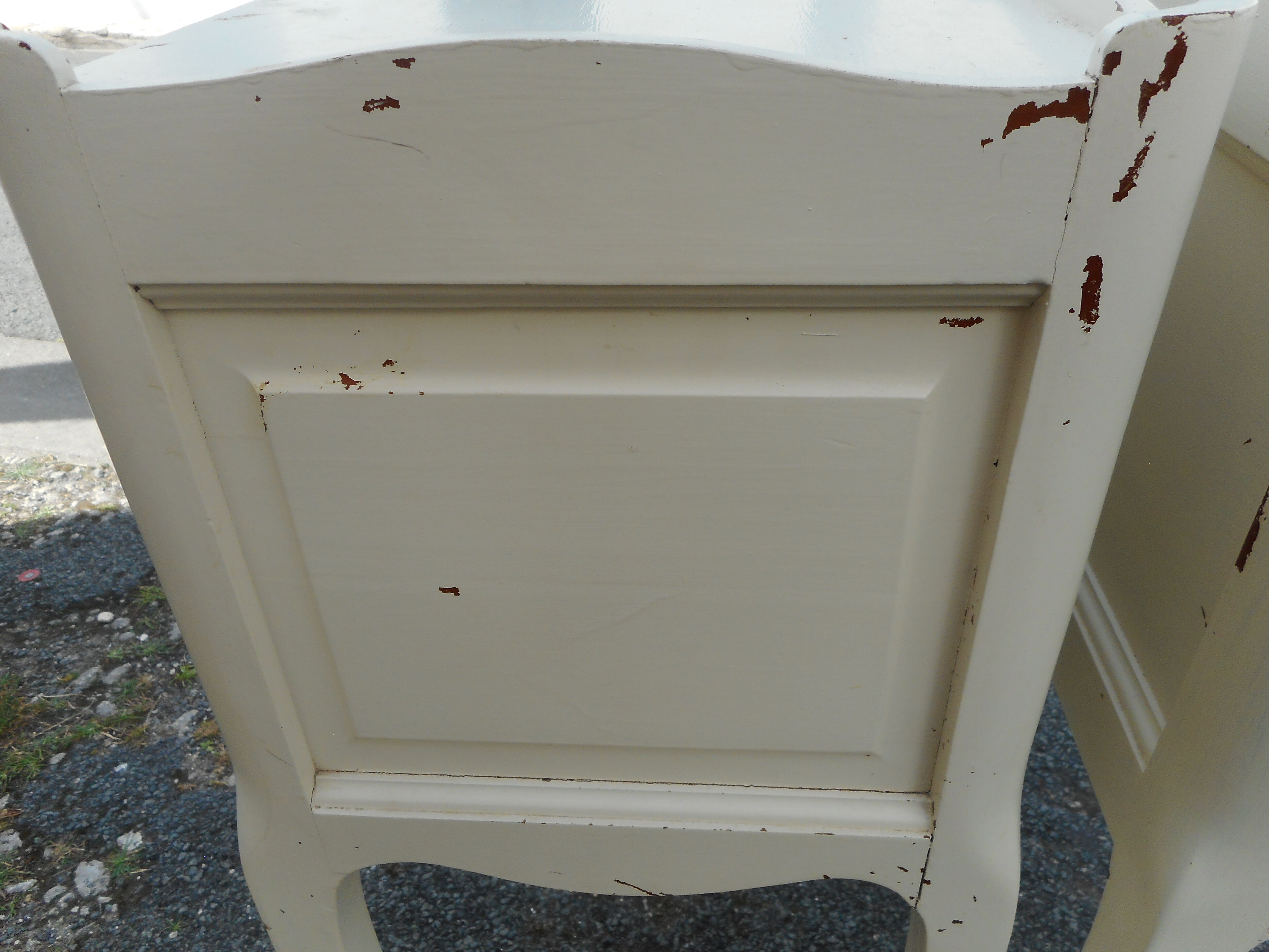 Pair of white lacquered bedside tables