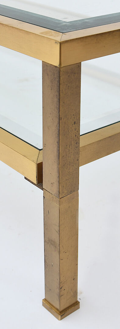 Coffee table in gilded brass and glass