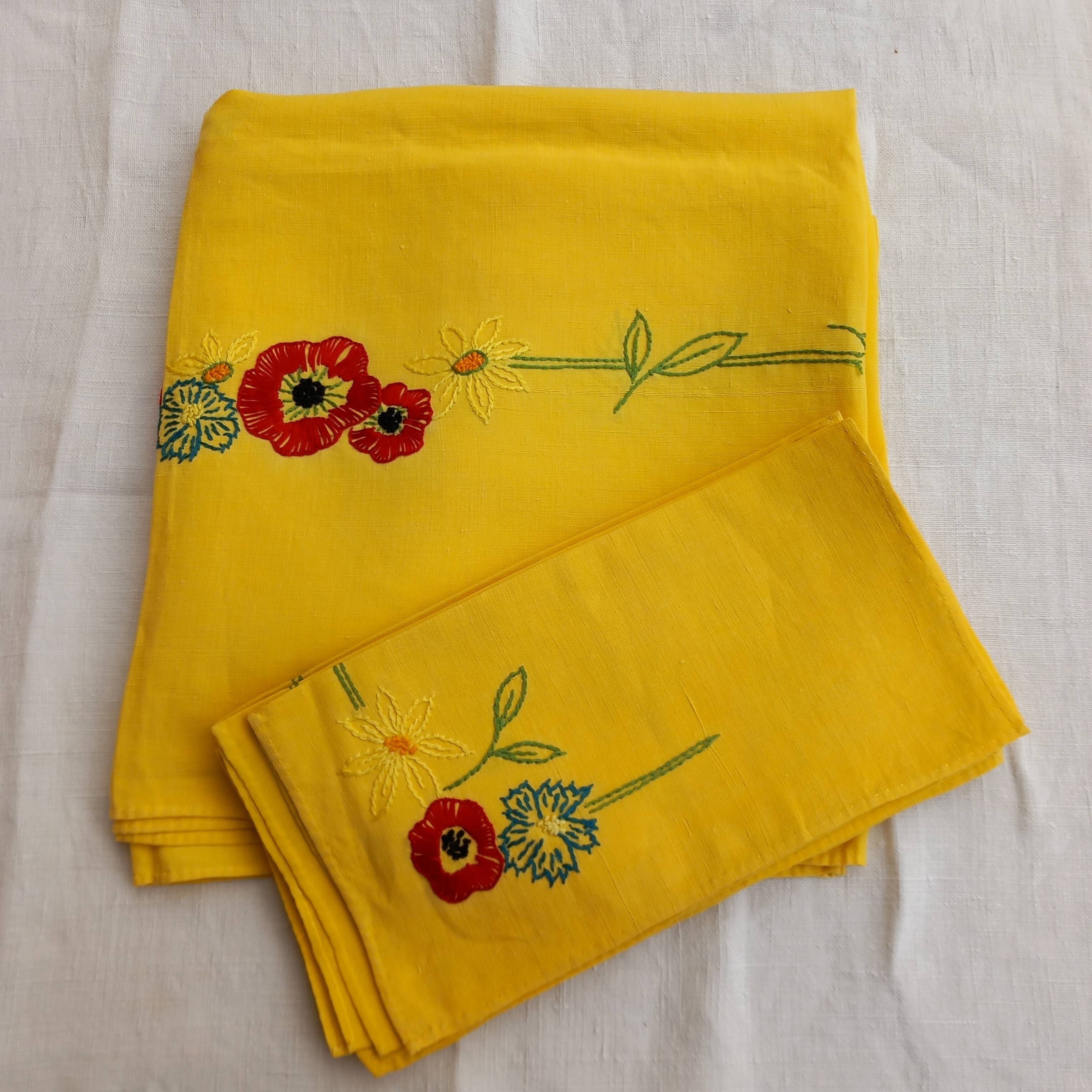 Small vintage yellow embroidered tablecloth and 12 napkins.