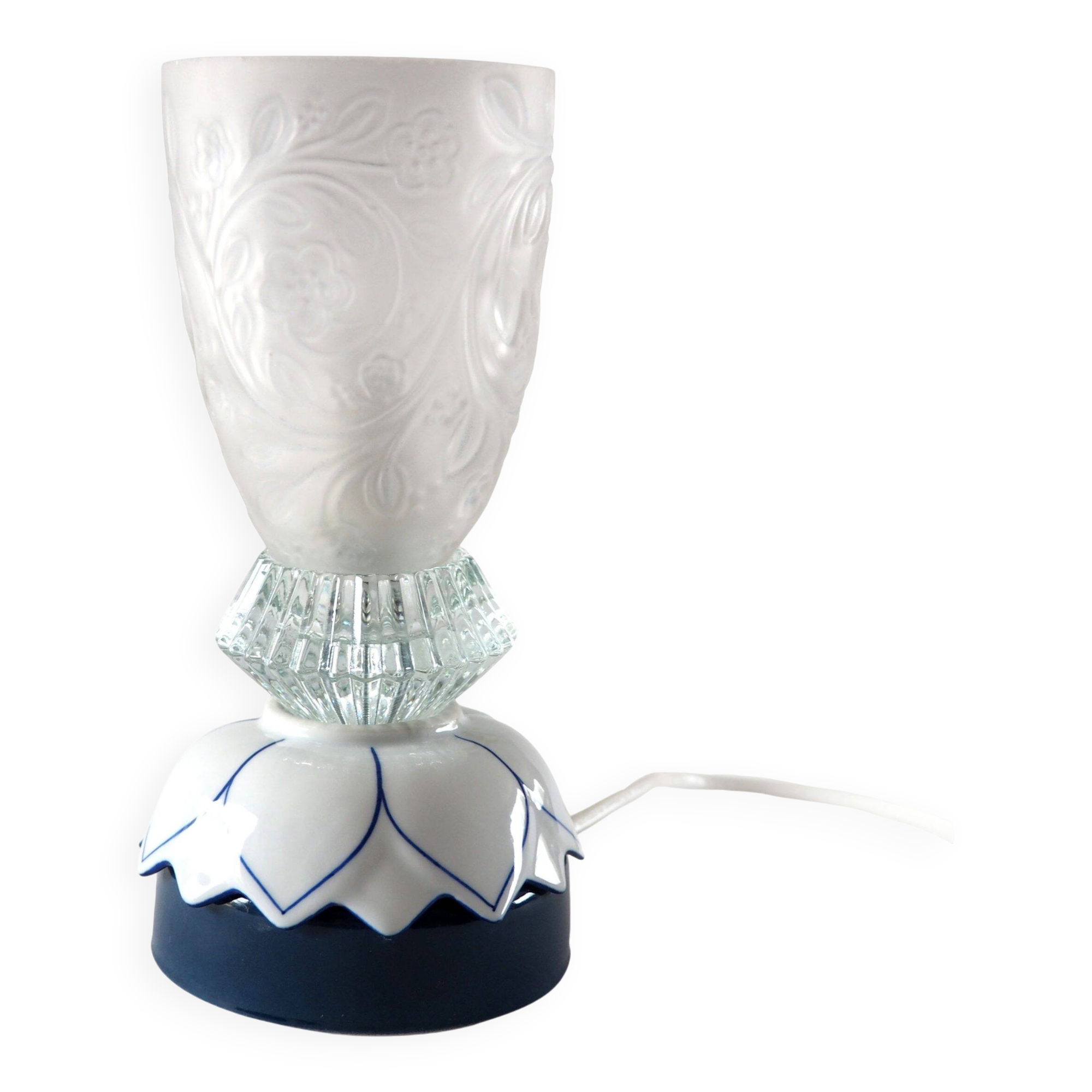 Glass lamp with floral relief in blue lotus design.
