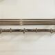20s chrome wall coat rack