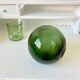 Green blown glass ball, old fishing float
