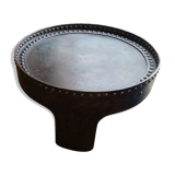 Riveted metal table