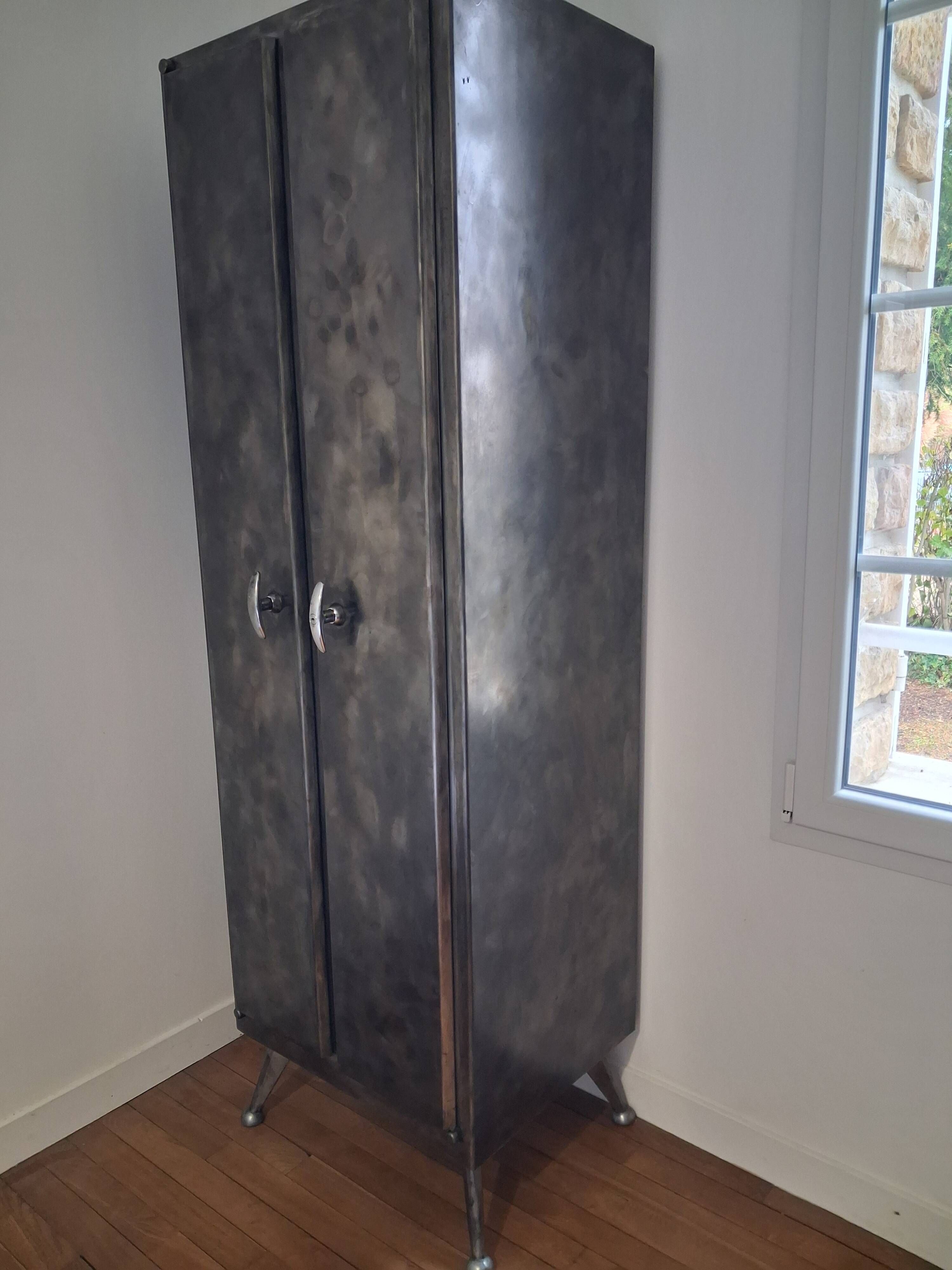1960s factory infirmary metal cabinet with ball feet and compass.