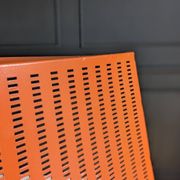 Vintage metal magazine rack in perforated orange/Mathieu Mategot style/70s